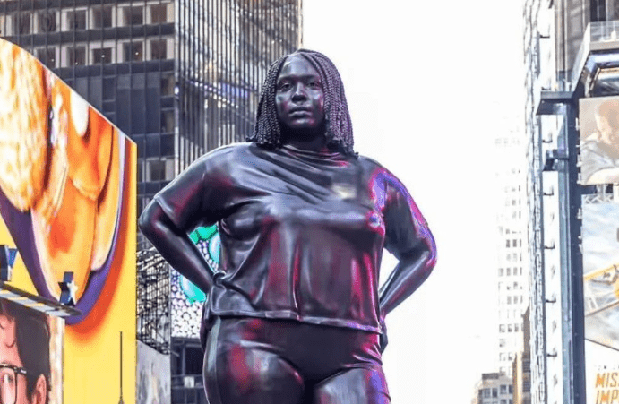 Bronze Statue Of A Woman Installed in the middle of Times Square
